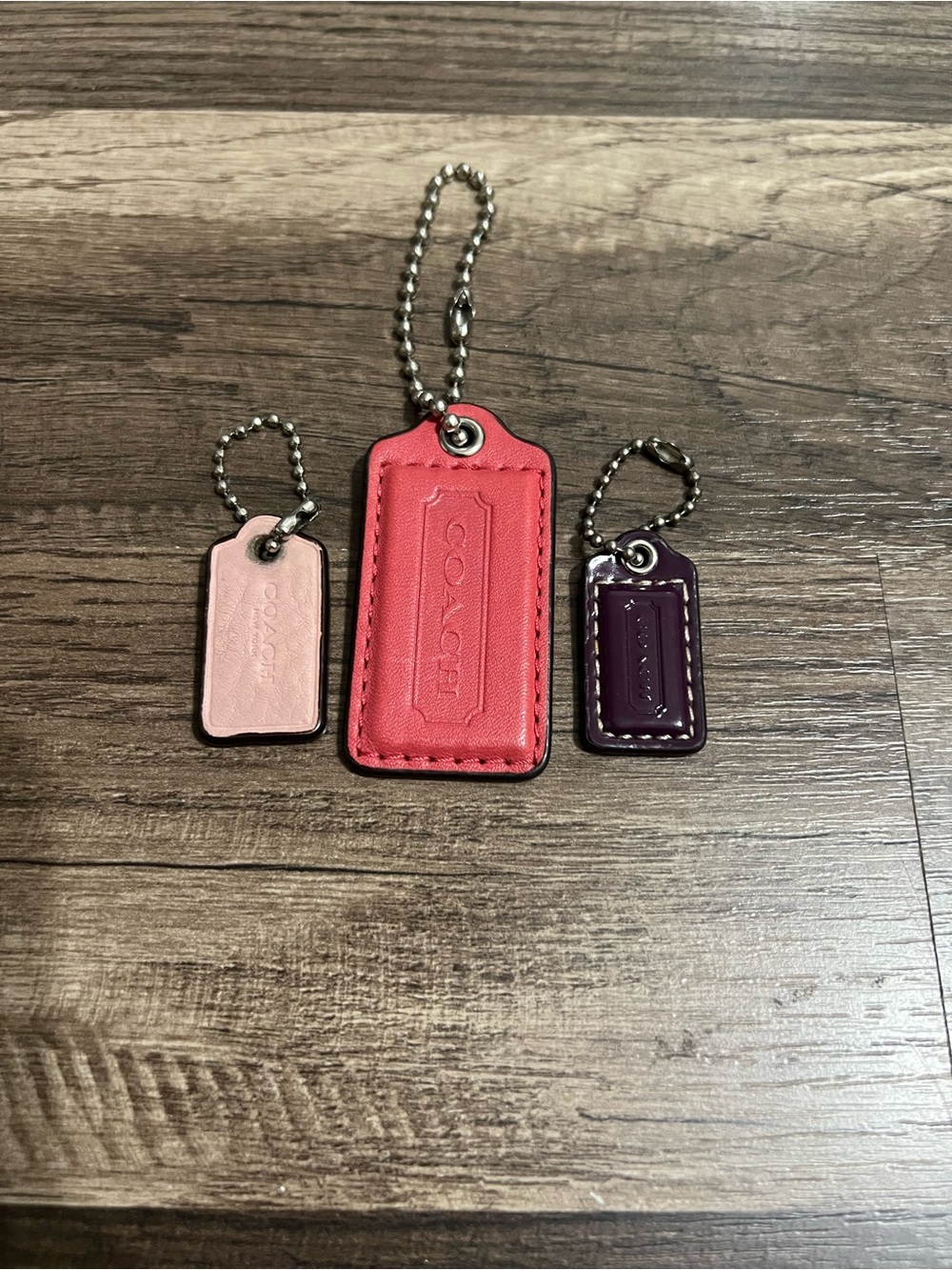 3pc COACH lot Leather hangtag Keychain bag charm Trio in Pink, Red, Plum